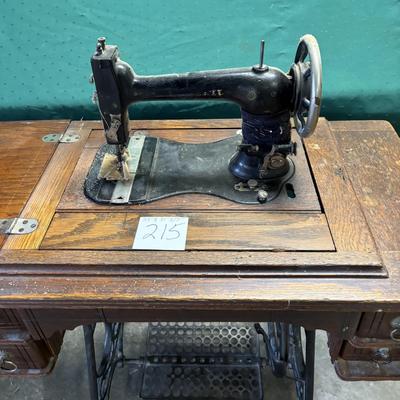 Queen Sewing Machine and Cabinet
