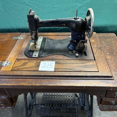 Queen Sewing Machine and Cabinet