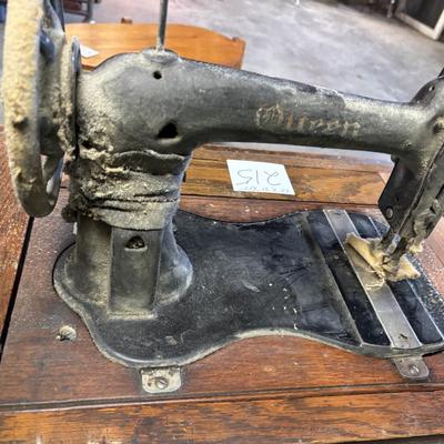 Queen Sewing Machine and Cabinet