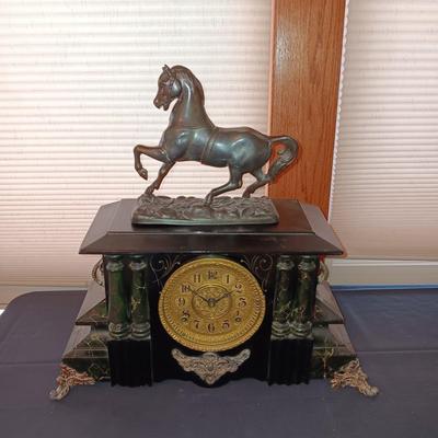 WILLIAM L GILBERT ANTIQUE CLOCK AND A BRONZE HORSE THAT HAS ALWAYS SAT ON TOP OF CLOCK