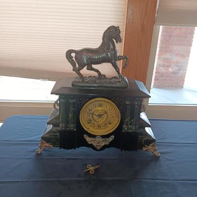 WILLIAM L GILBERT ANTIQUE CLOCK AND A BRONZE HORSE THAT HAS ALWAYS SAT ON TOP OF CLOCK