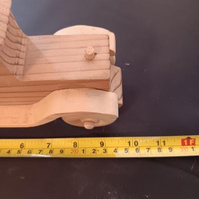 HAND CRAFTED WOODEN TOYS WITH AN EMBEDDED PENNY FOR THE YEAR THEY WERE MADE