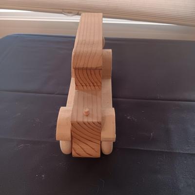 HAND CRAFTED WOODEN TOYS WITH AN EMBEDDED PENNY FOR THE YEAR THEY WERE MADE