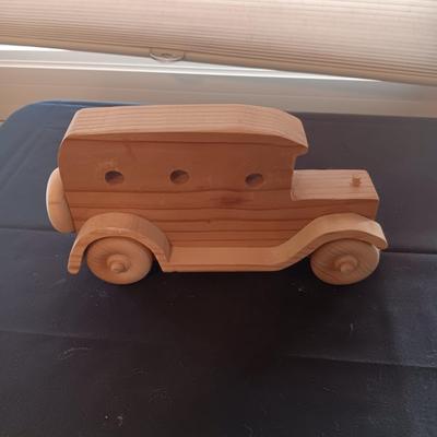 HAND CRAFTED WOODEN TOYS WITH AN EMBEDDED PENNY FOR THE YEAR THEY WERE MADE