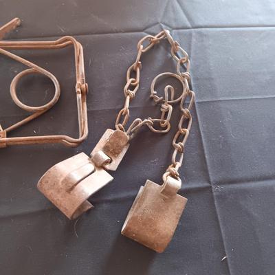 ANTIQUE COW LEG HOBBLER KICKERS AND AN OLD ANIMAL TRAP