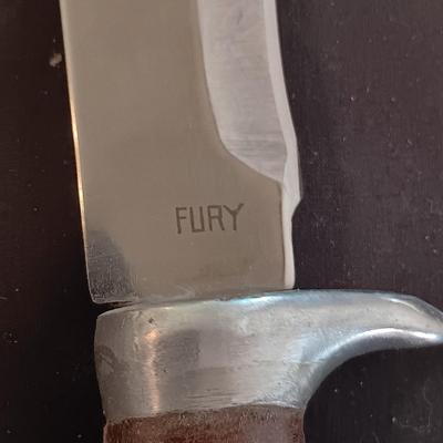 FIXED BLADE KNIFE MARKED "FURY" AND A FOLDING POCKET KNIFE BOTH HAVE SHEATHS