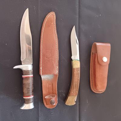 FIXED BLADE KNIFE MARKED "FURY" AND A FOLDING POCKET KNIFE BOTH HAVE SHEATHS