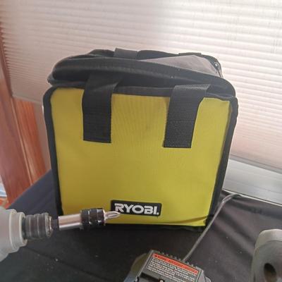 2 RYOBI CORDLESS DRILLS, 2 BATTERIES, 1 CHARGER AND A CARRY BAG