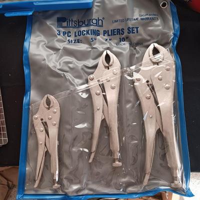 NEW 3 PC LOCKING PLIERS, VOLTAGE MULTI TESTER AND A SOCKET SET