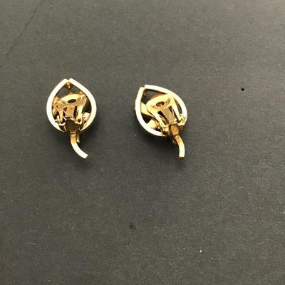 Sale Photo Thumbnail #116: Beautiful vintage, gold tone Austria signed AB rhinestone clip on earrings Please see attached photos.