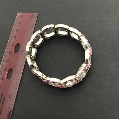 Sale Photo Thumbnail #134: Very nice pink rhinestone, silver tone, stretchy bracelet. Please see attached photos.