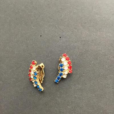 Sale Photo Thumbnail #135: Very nice gold tone, vintage patriot, red white, and blue rhinestones clip on earrings. Please see attached photos.