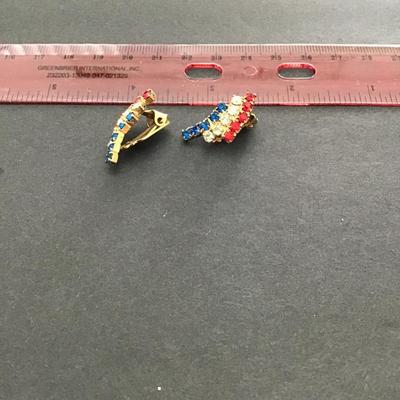 Sale Photo Thumbnail #136: Very nice gold tone, vintage patriot, red white, and blue rhinestones clip on earrings. Please see attached photos.
