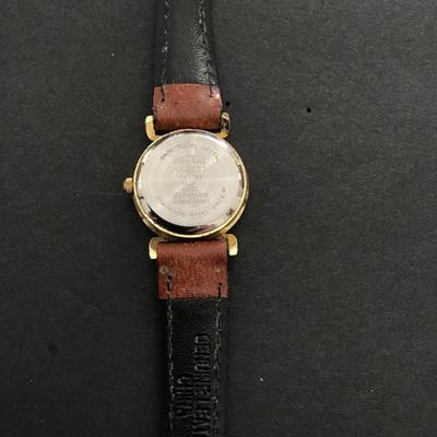 Sale Photo Thumbnail #181: Faded glory analog, watch with moon phase indicator working please see attached photos