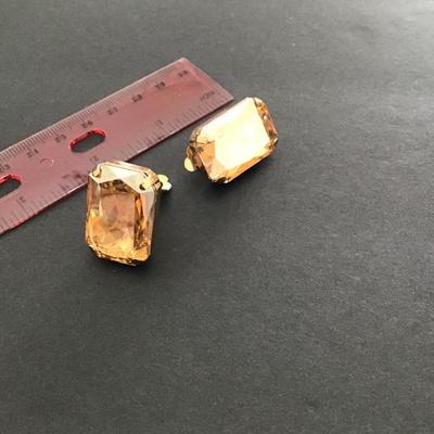Sale Photo Thumbnail #200: Very nice pair of citrine glass rhinestone clip on earrings . Please see attached photos.
