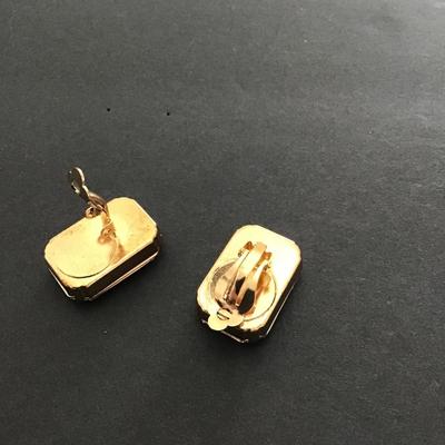 Sale Photo Thumbnail #201: Very nice pair of citrine glass rhinestone clip on earrings . Please see attached photos.