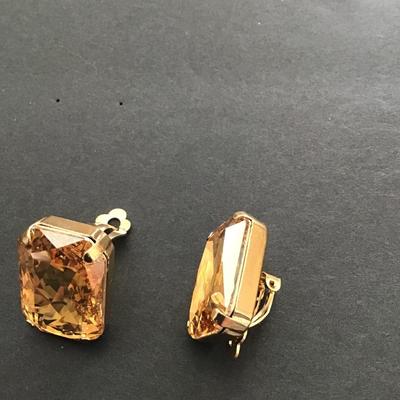 Sale Photo Thumbnail #199: Very nice pair of citrine glass rhinestone clip on earrings . Please see attached photos.