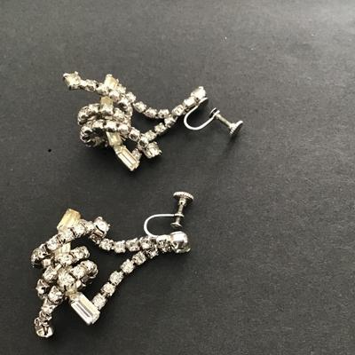Sale Photo Thumbnail #214: Very nice vintage rhinestone screw back earrings with knotted design. Please see attached photos.