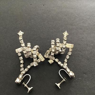Sale Photo Thumbnail #216: Very nice vintage rhinestone screw back earrings with knotted design. Please see attached photos.