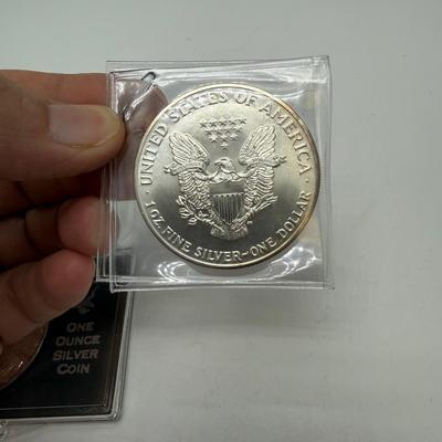 Two One-Troy Ounce Silver Eagle Dollars (ST-SS)