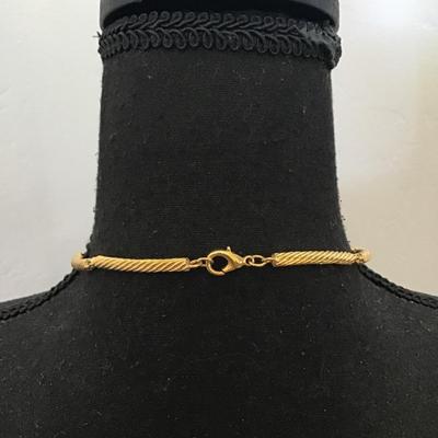 Beautiful gold and silver toned cable necklace. Very nice quality.