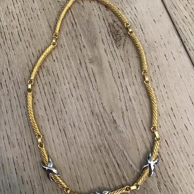 Beautiful gold and silver toned cable necklace. Very nice quality.