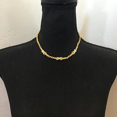 Beautiful gold and silver toned cable necklace. Very nice quality.