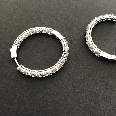 Beautiful Silvertone hinged earrings with clear rhinestone