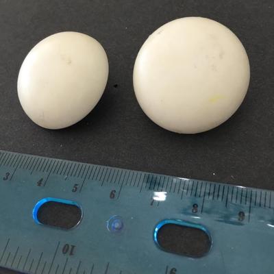 Lucite type domed, circular stud earrings