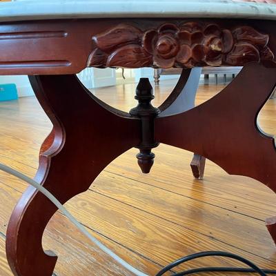 Sale Photo Thumbnail #146: Vintage Victorian-style low marble top table; approx. 17.5" x 33.5" x 22";  wear to base, crack to part of marble