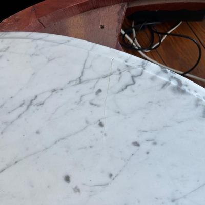 Sale Photo Thumbnail #145: Vintage Victorian-style low marble top table; approx. 17.5" x 33.5" x 22";  wear to base, crack to part of marble