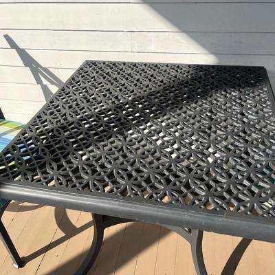 Sale Photo Thumbnail #203: O.W. Lee cast aluminum patio dinette table w/ two chairs; table 29" x 34"; chairs 19" seat w/cushion, 38" back x 19" W x 24 D