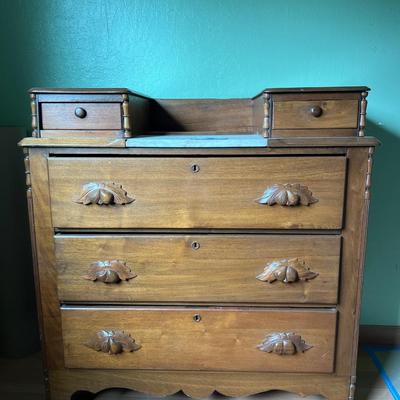 Walnut Chest of Drawers with Carved Pulls & Handkerchief Drawers