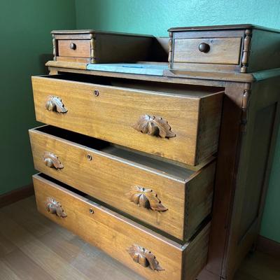 Walnut Chest of Drawers with Carved Pulls & Handkerchief Drawers