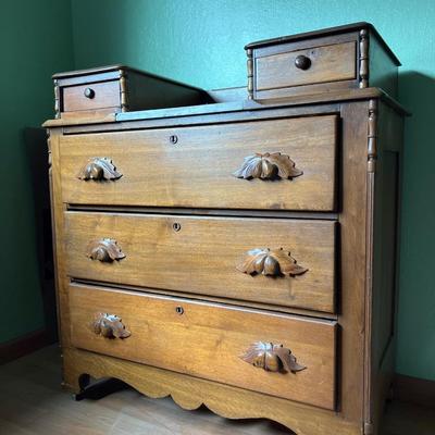 Walnut Chest of Drawers with Carved Pulls & Handkerchief Drawers
