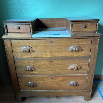 Walnut Chest of Drawers with Carved Pulls & Handkerchief Drawers