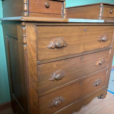 Walnut Chest of Drawers with Carved Pulls & Handkerchief Drawers