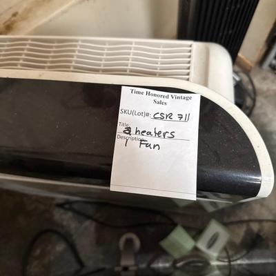 Two heaters and a tower fan