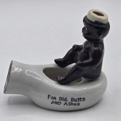 LOT 20: Vintage Silent Sam Adamson's Adventure Cartoon Character Salt Shaker, Vintage Ashtray Porcelain Baby on Bed Pan, and More