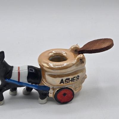 LOT 20: Vintage Silent Sam Adamson's Adventure Cartoon Character Salt Shaker, Vintage Ashtray Porcelain Baby on Bed Pan, and More