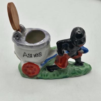 LOT 20: Vintage Silent Sam Adamson's Adventure Cartoon Character Salt Shaker, Vintage Ashtray Porcelain Baby on Bed Pan, and More