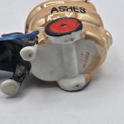 LOT 20: Vintage Silent Sam Adamson's Adventure Cartoon Character Salt Shaker, Vintage Ashtray Porcelain Baby on Bed Pan, and More