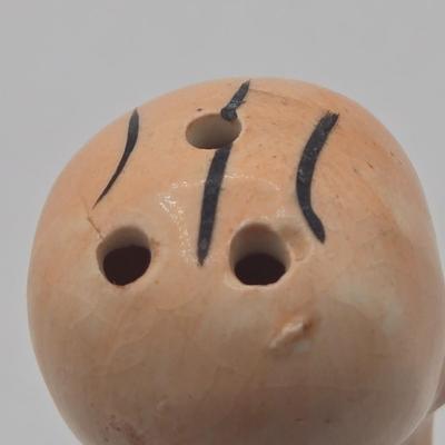 LOT 20: Vintage Silent Sam Adamson's Adventure Cartoon Character Salt Shaker, Vintage Ashtray Porcelain Baby on Bed Pan, and More