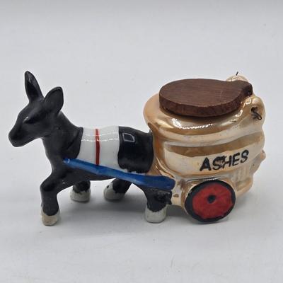 LOT 20: Vintage Silent Sam Adamson's Adventure Cartoon Character Salt Shaker, Vintage Ashtray Porcelain Baby on Bed Pan, and More