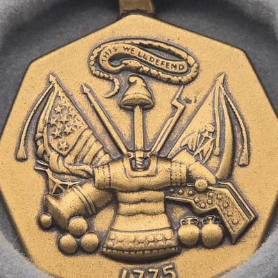 LOT 23J: Two Army Achievement Medals, WW2 US Army Honorable Discharge Buttonhole Lapel Pin Ruptured Duck Buttons, and More