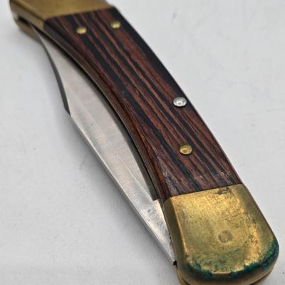 LOT 31J: NIB 3 Pocket Knives with Eagle Design, Buck Knife with Case, and More