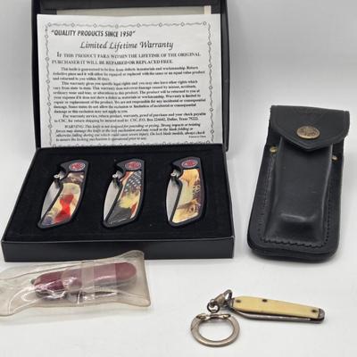 LOT 31J: NIB 3 Pocket Knives with Eagle Design, Buck Knife with Case, and More