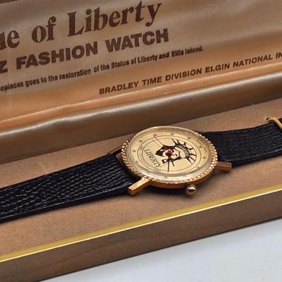 LOT 33J: Vintage Elgin Bradley Quartz Statue of Liberty Watch, Lenox Crystal Heart Watch, and Waltham Prestige Quartz Watch All in...