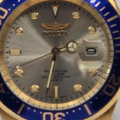 LOT 35J: Invicta Pro Diver Men's Watch and Caravelle by Bulova New York Women's Watch
