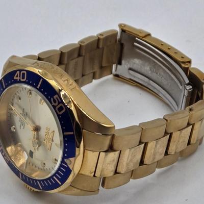 LOT 35J: Invicta Pro Diver Men's Watch and Caravelle by Bulova New York Women's Watch